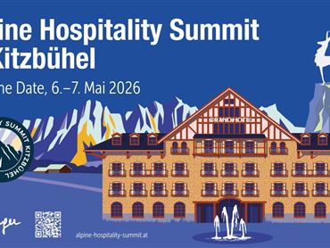Ein Hotel steht im Vordergrund, es ist das Grand Hotel, dahinter sind Berge und die stilisierte Kitzbühel Gams.Das Bild ist im Zeichentrikstil.